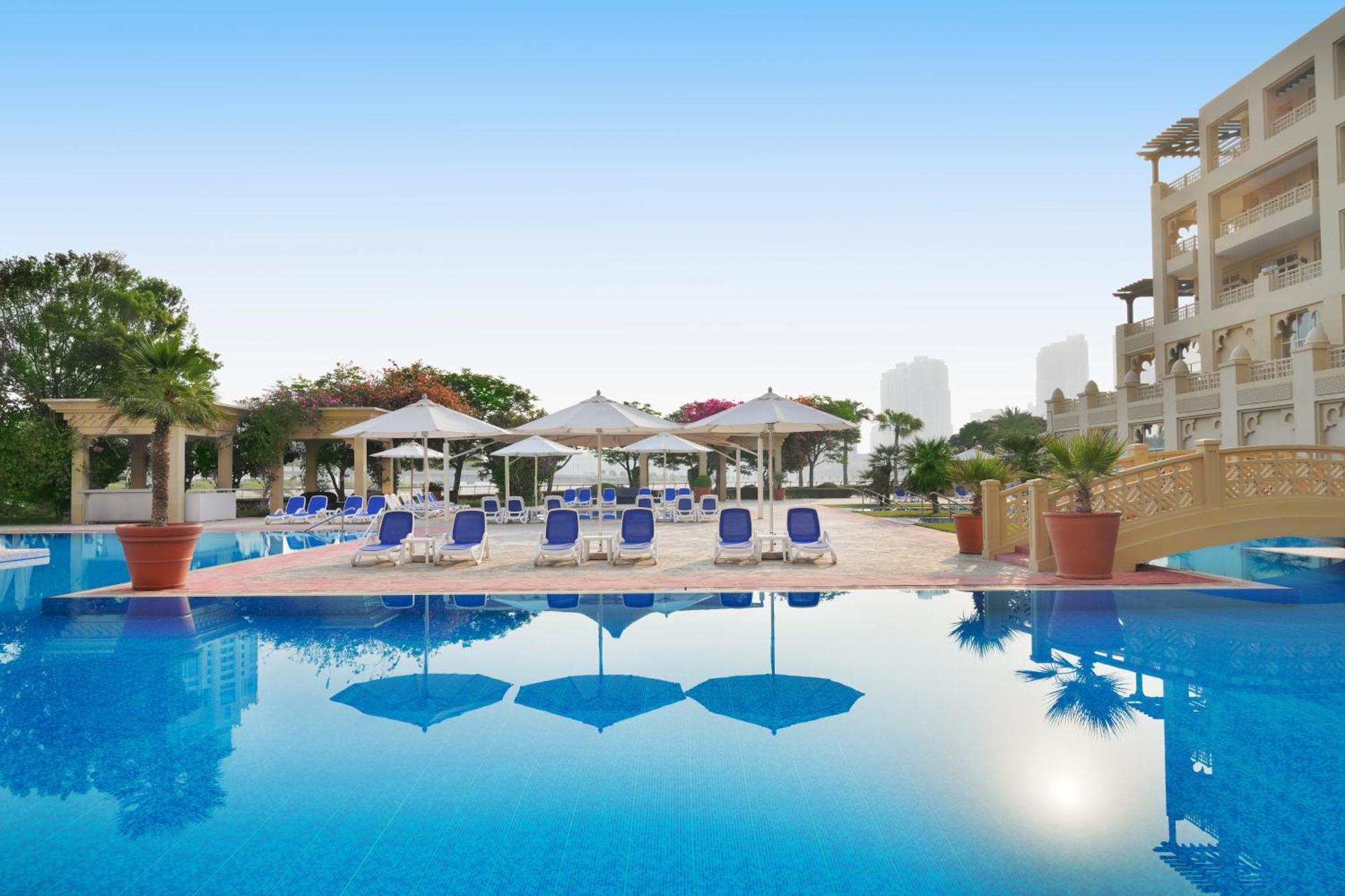 Grand Hyatt Doha Hotel & Villas Exterior photo The swimming pool at the Jumeirah Creekside